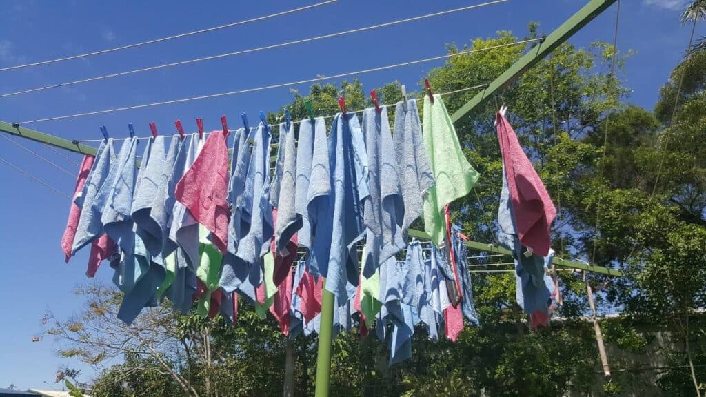 cloth towels hanging to dry under the sun