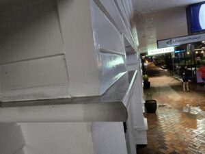 a clean white window ledge after pressure cleaning